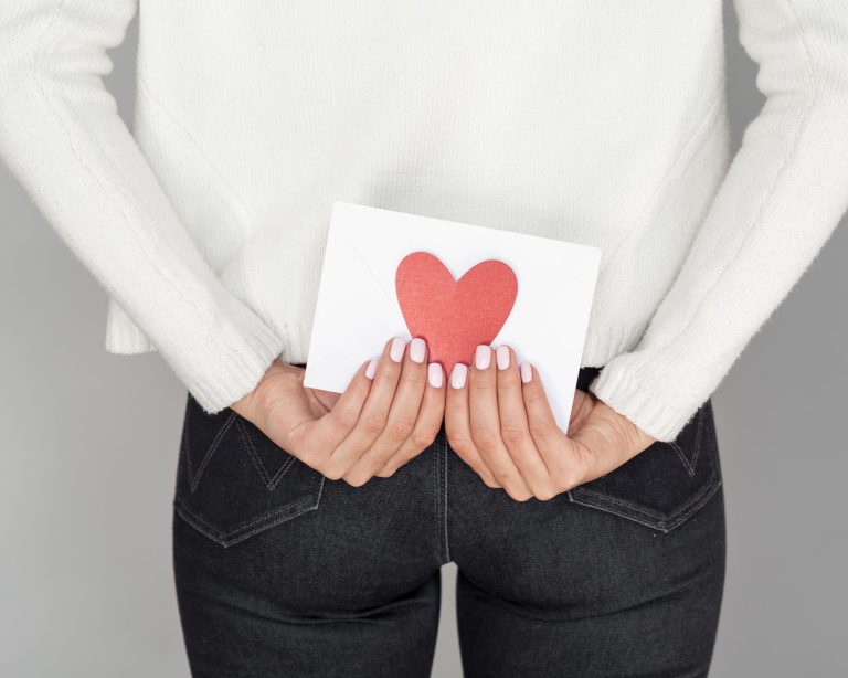 woman holding love envelope back view woman holding love envelope back view