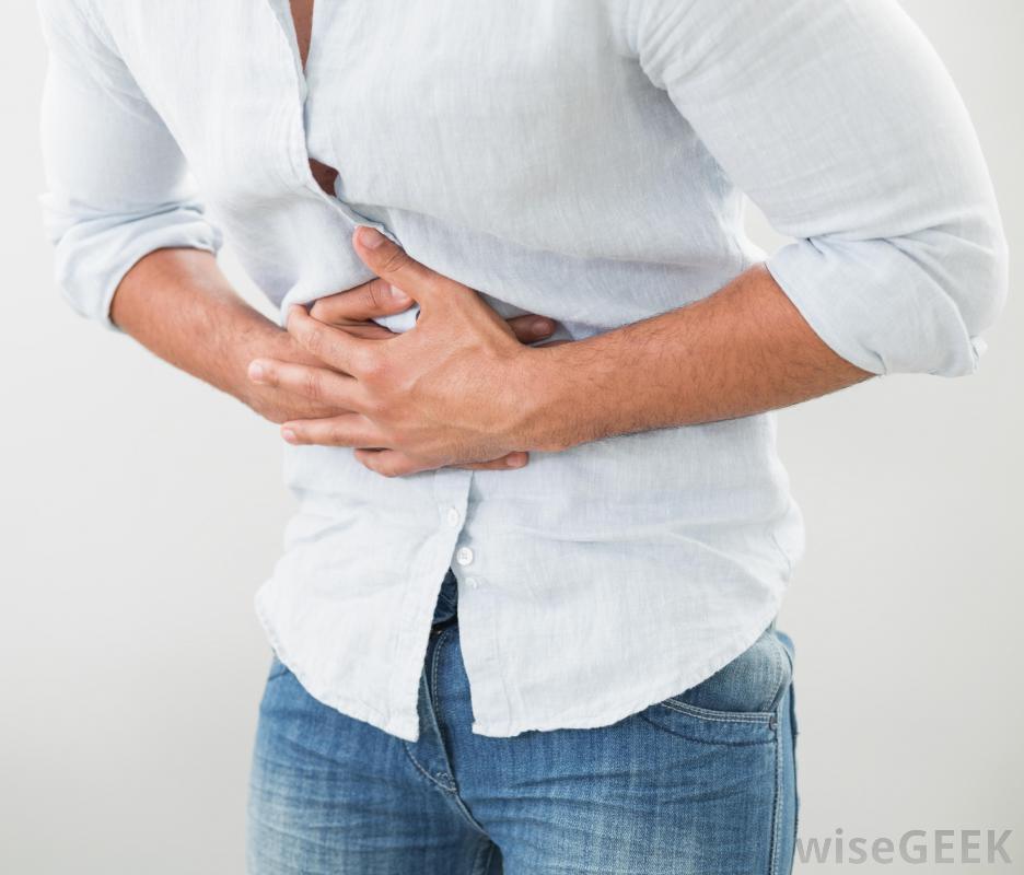 person-holding-stomach-in-pain